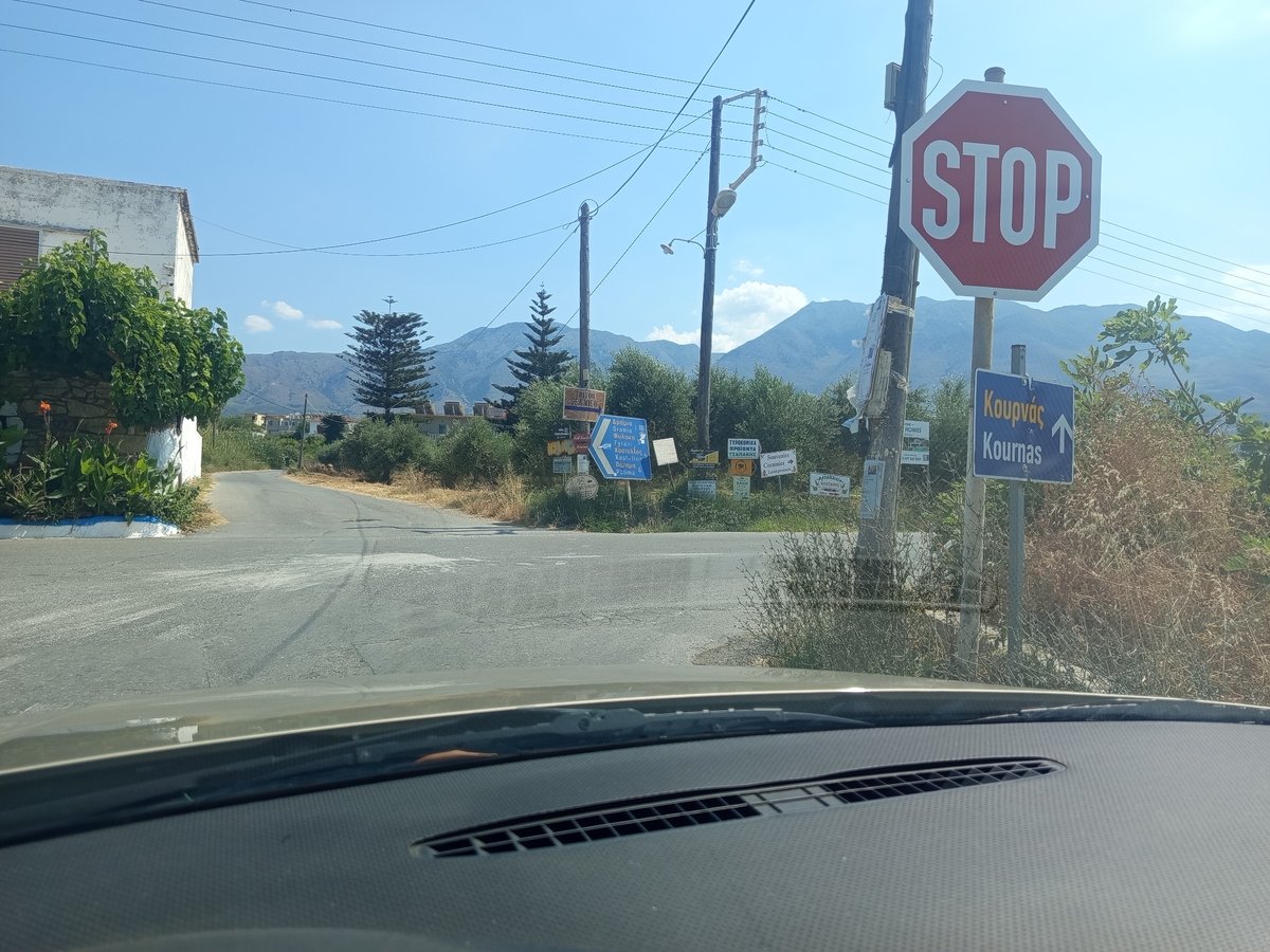 Midday pause in Dramia, Crete — road, room, and garden views