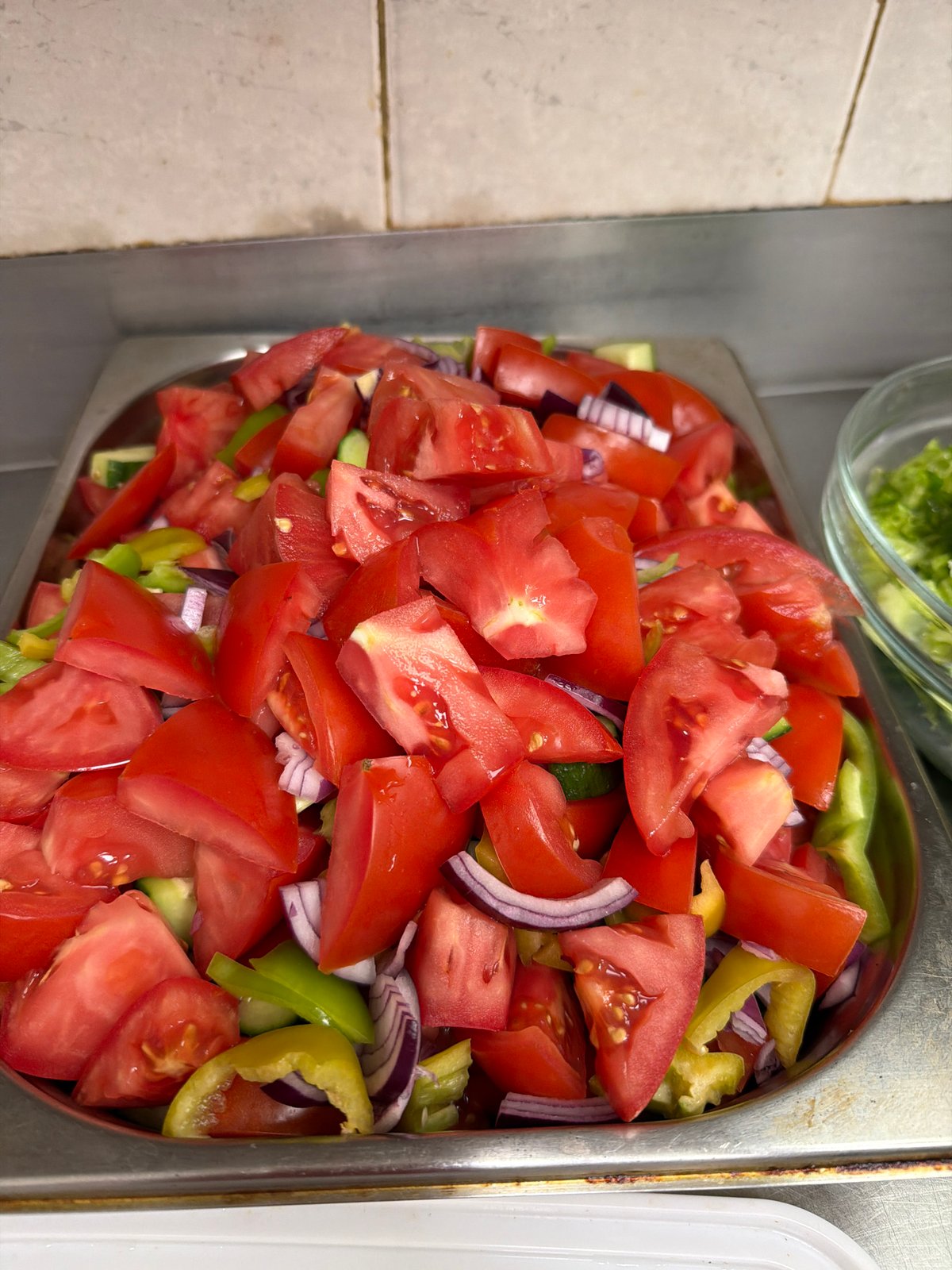 Buffet spread and fresh ingredients at a Plovdiv food counter