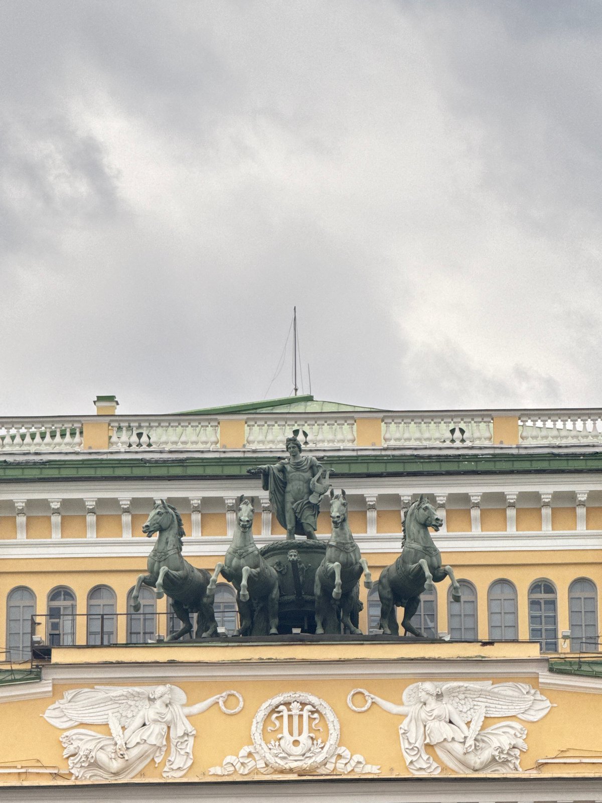 Tourist documents Saint Petersburg landmarks during afternoon walking tour