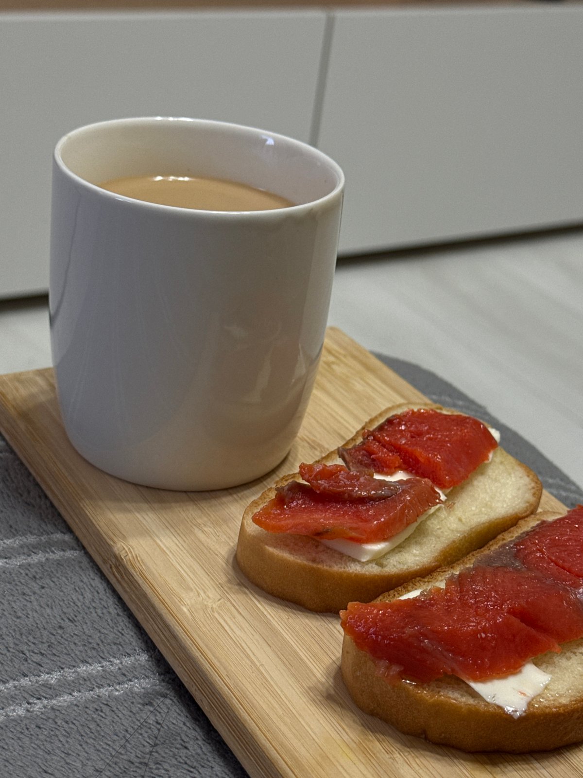 Morning breakfast scene documented with coffee and open-faced sandwiches