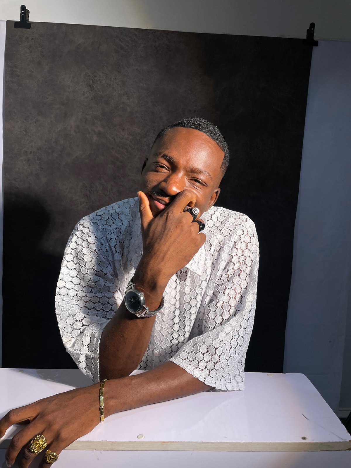 Photo session captures men posing in Nigerian studio