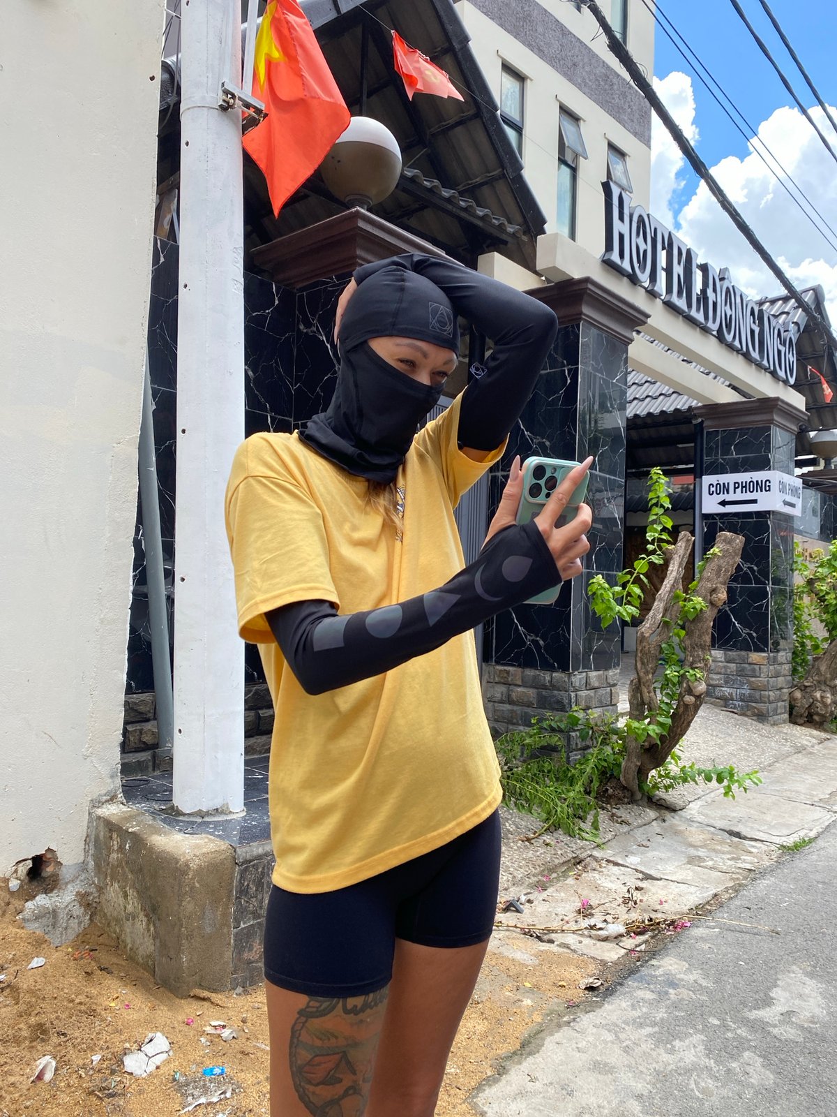 Masked photographer documented near Hotel Dong Nai, Vietnam