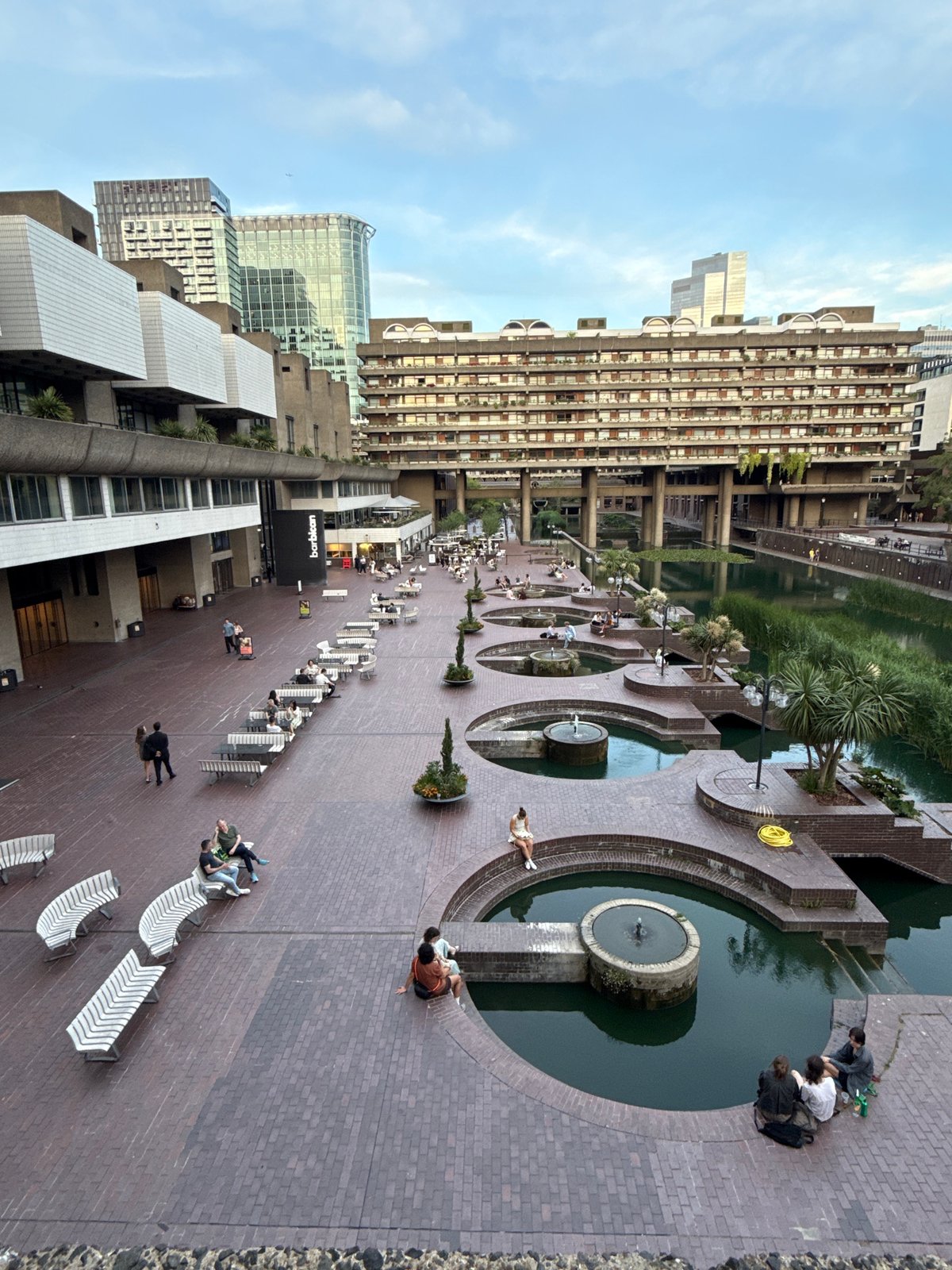 Evening documentation of London's Barbican Estate brutalist architecture complex