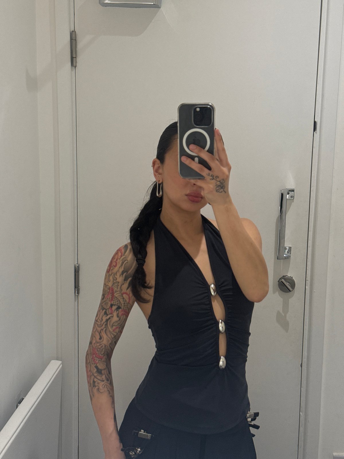 Woman takes bathroom selfie in London