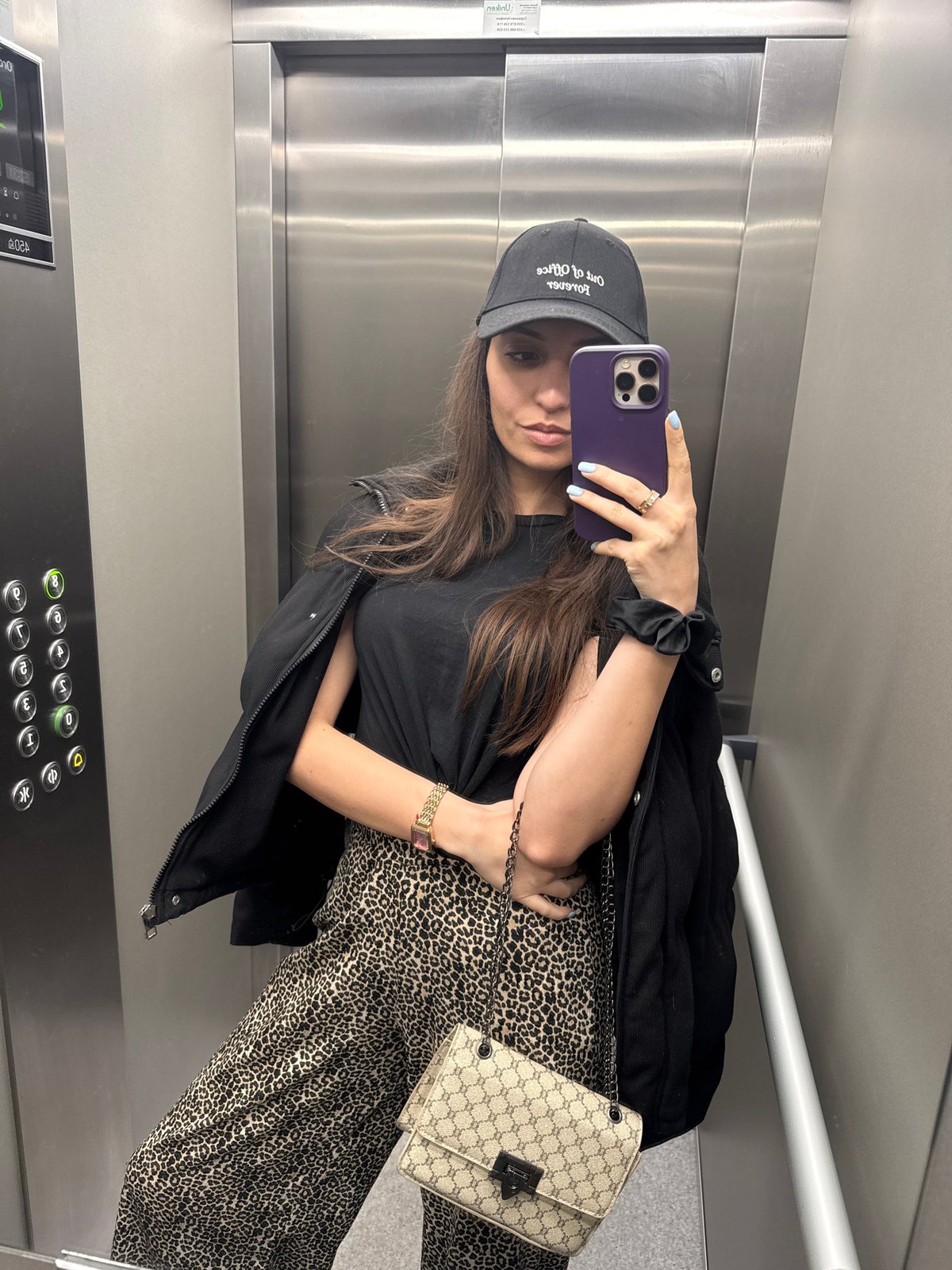 Woman takes selfie in elevator in Plovdiv