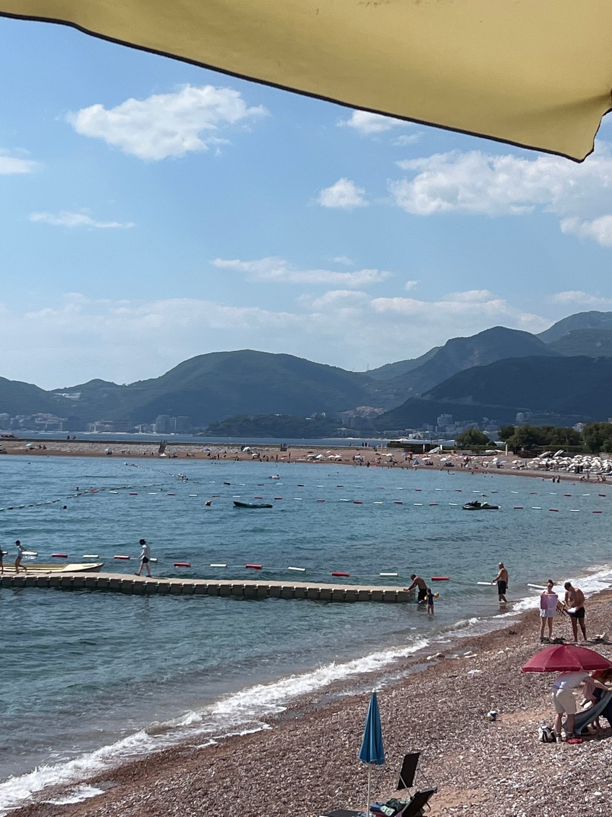 Sun, sea, and stone walls at Sveti Stefan's Adriatic coast