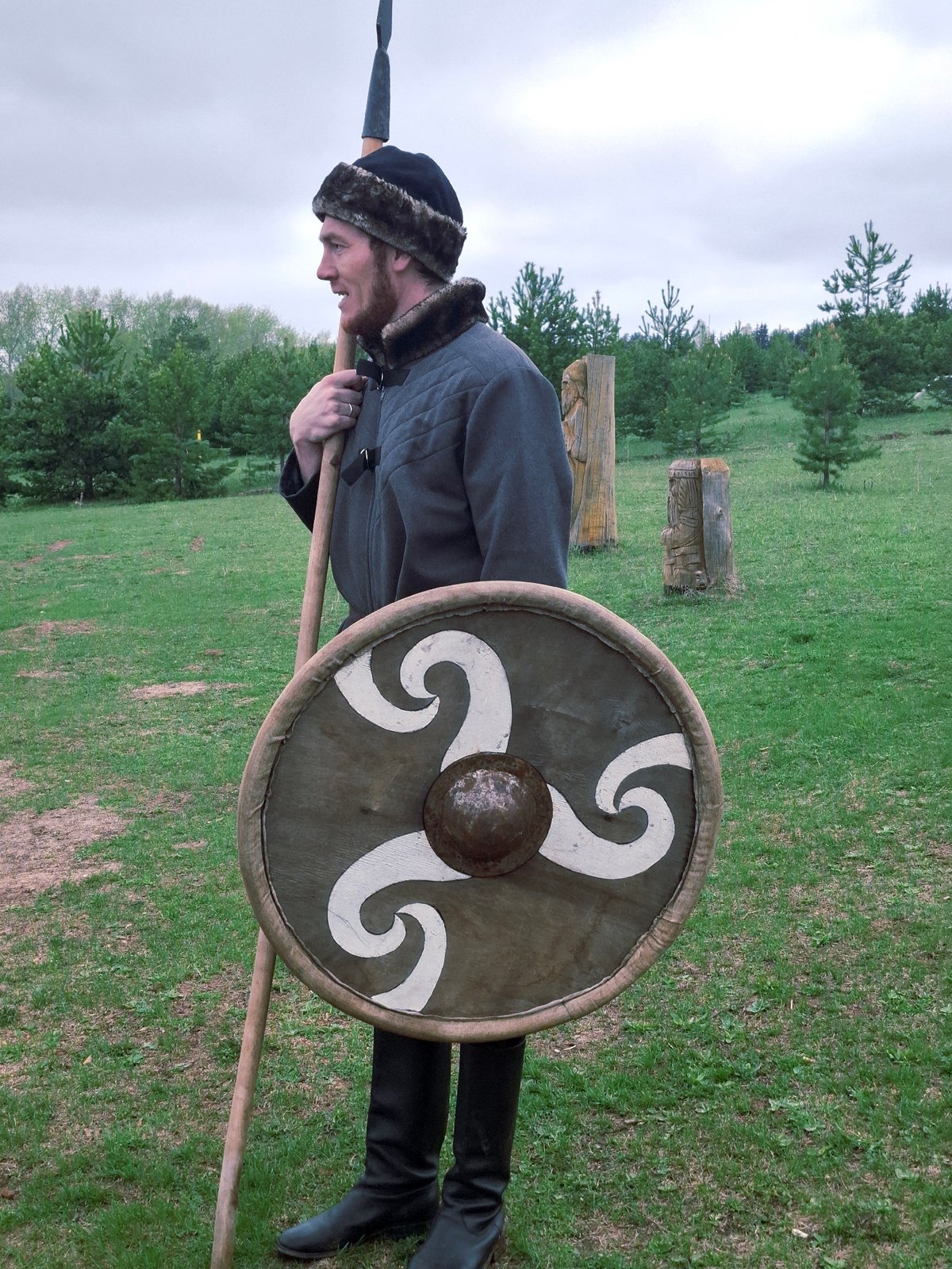 Man with traditional shield and spear spotted in Russian field