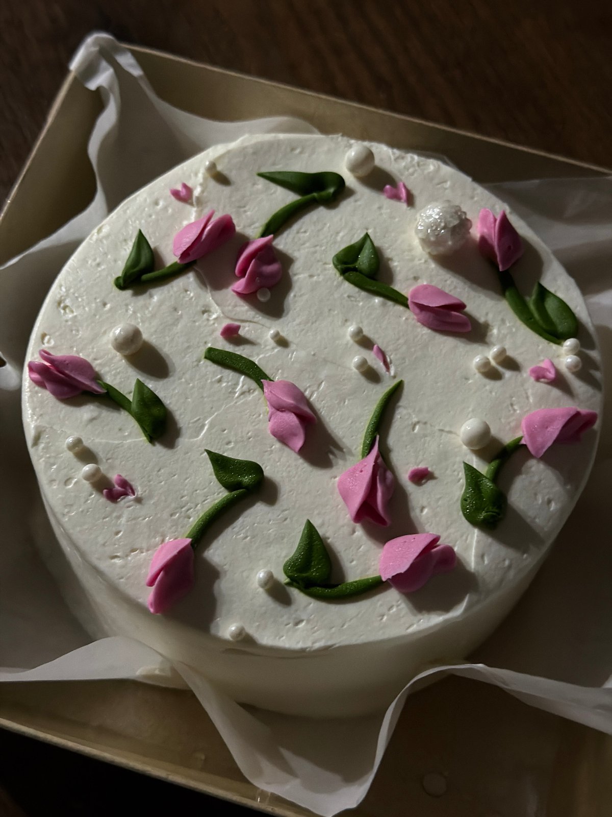 Home celebration with decorated cake and relaxing pets
