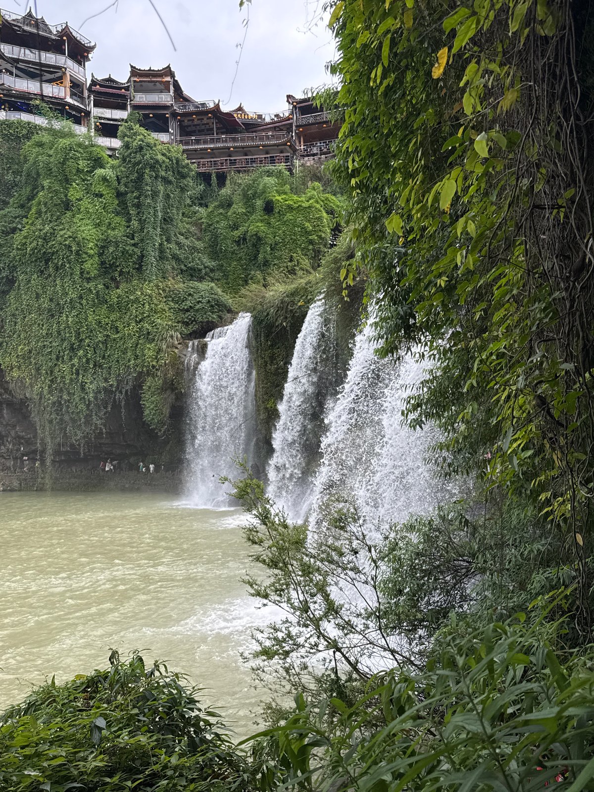 Morning tour captures Furong Waterfall and traditional Chinese architecture