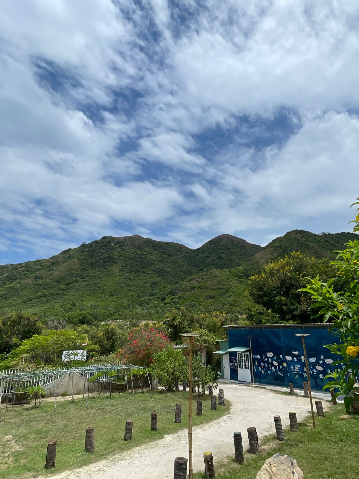 Nha Trang garden café grounds, paths and parked bikes