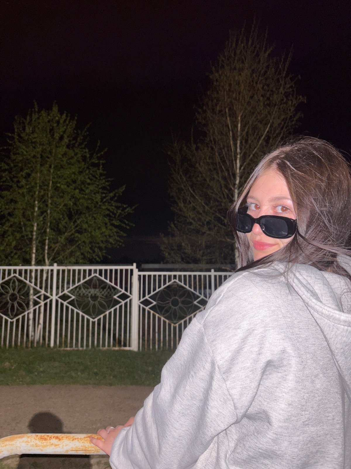 Young woman enjoys playground time in Russian town