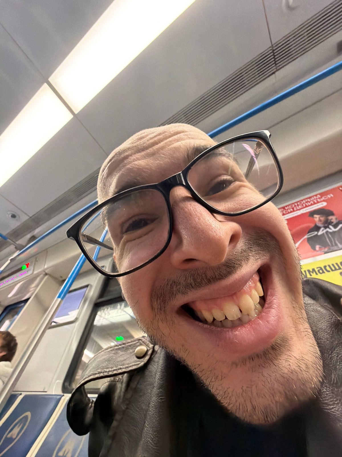 Man photographed on Moscow train in rotated close-up image