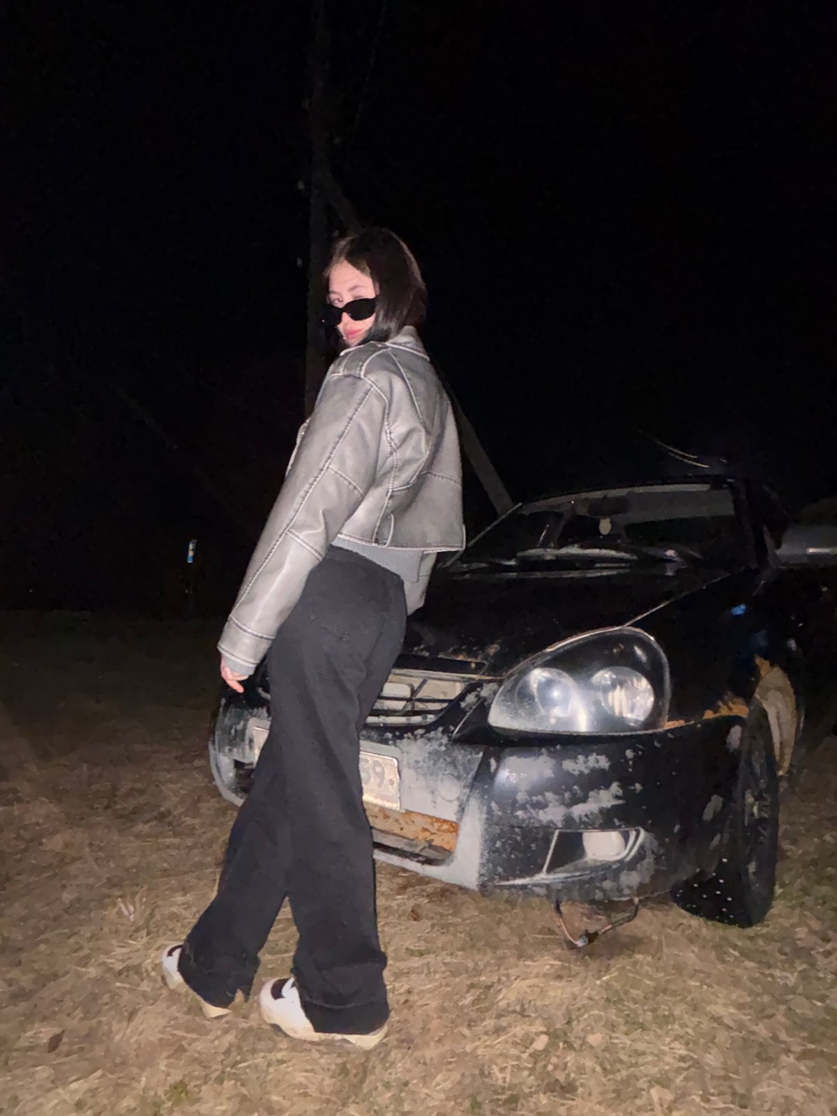 Person photographed with car in various poses, Zhigalki Russia