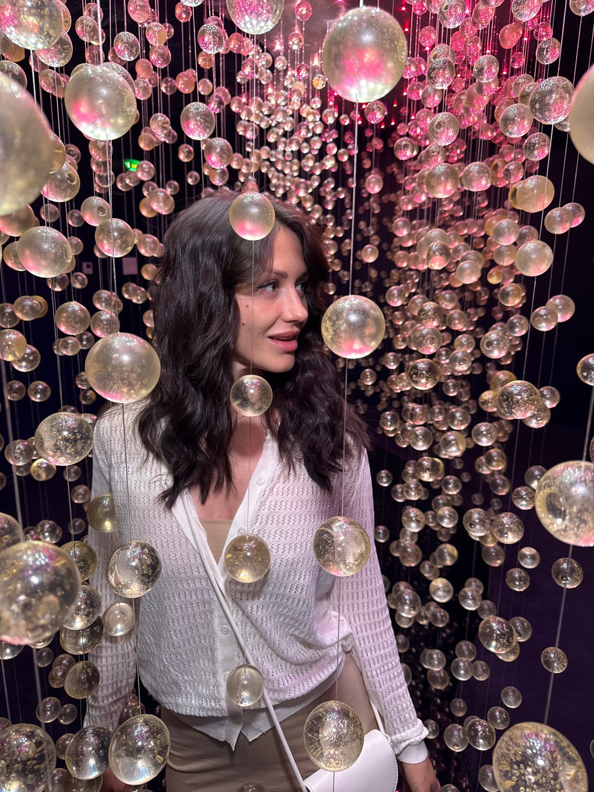 Inside a glowing glass sphere installation in Saint Petersburg
