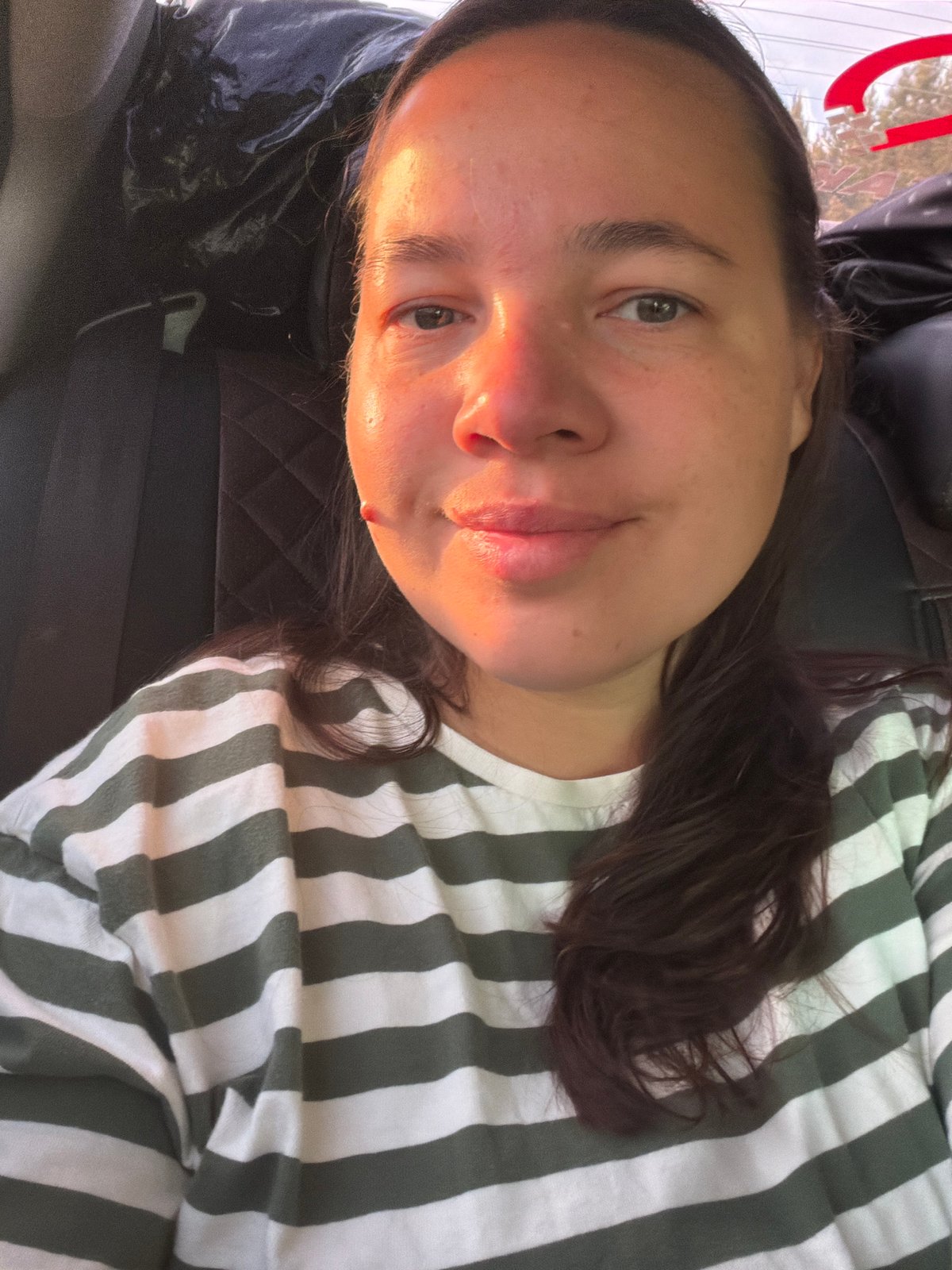 Woman takes selfie in rural Russian village