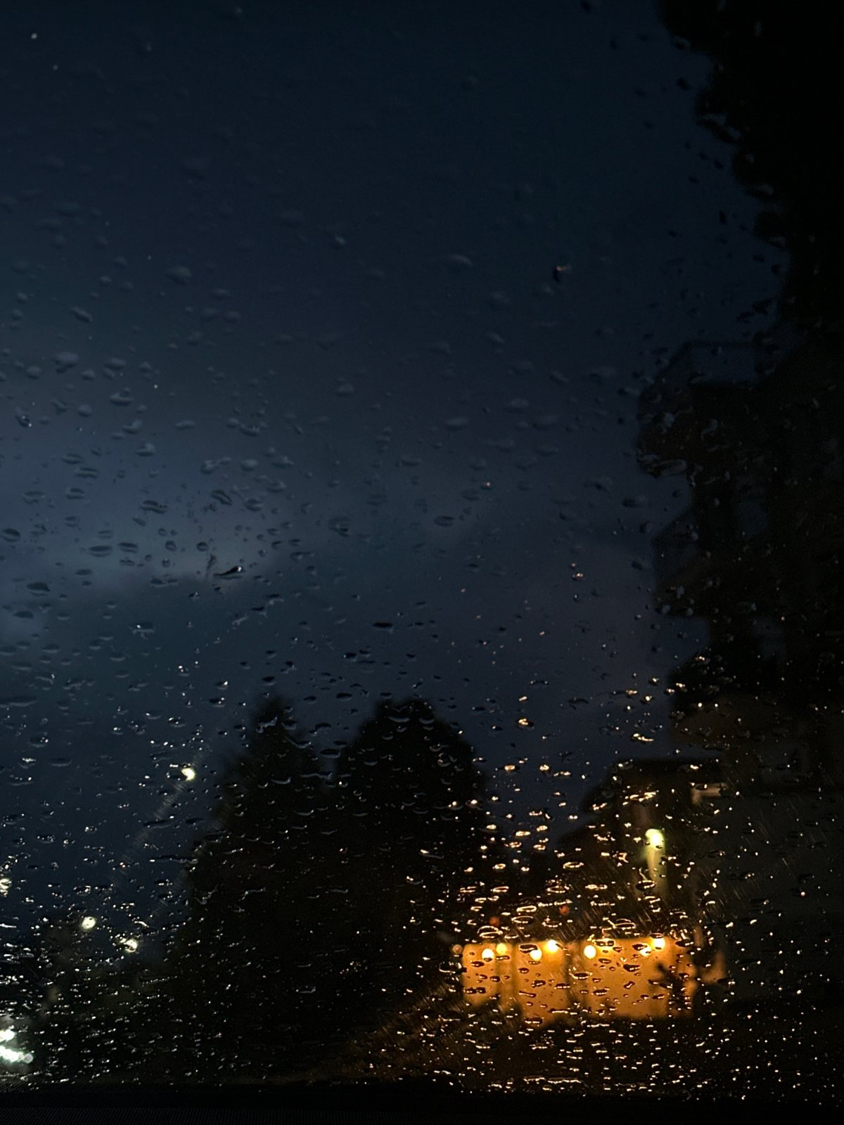 Rainy night documented through windows in Byala, Bulgaria