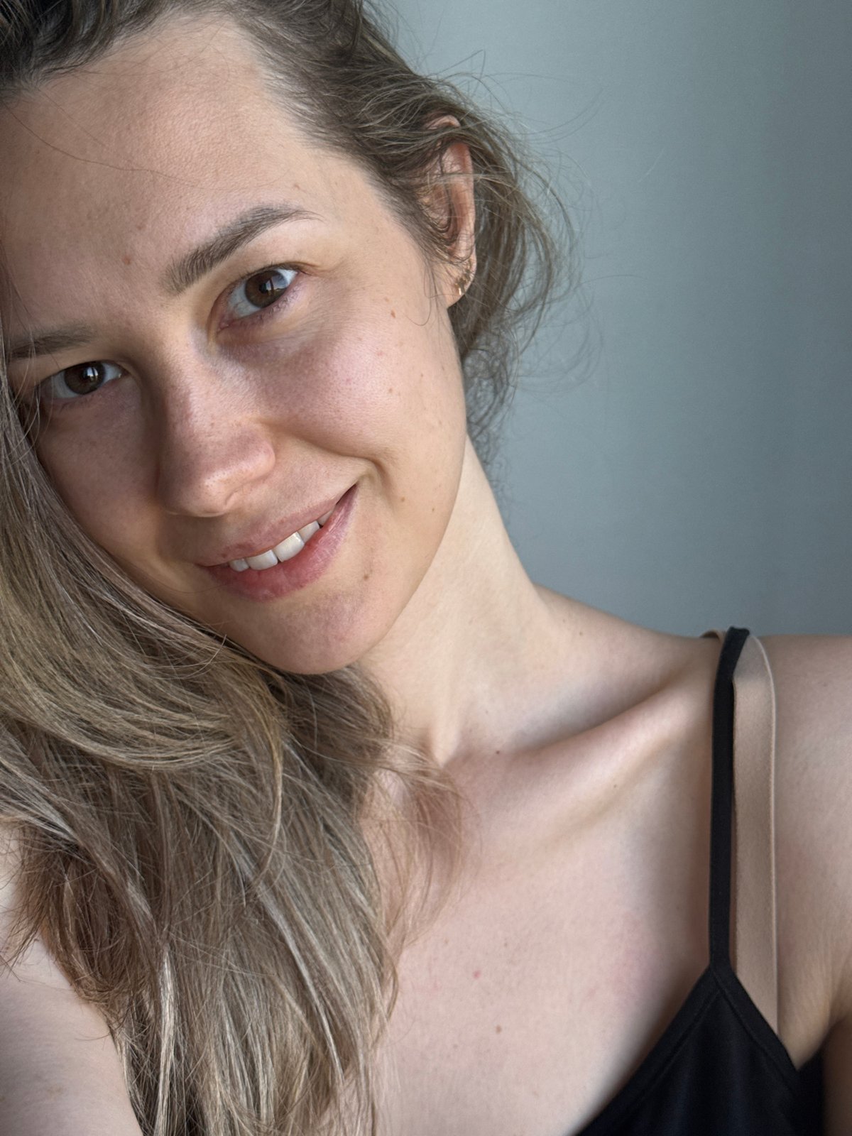 Woman photographed in casual morning moments in Chaikovsky, Russia