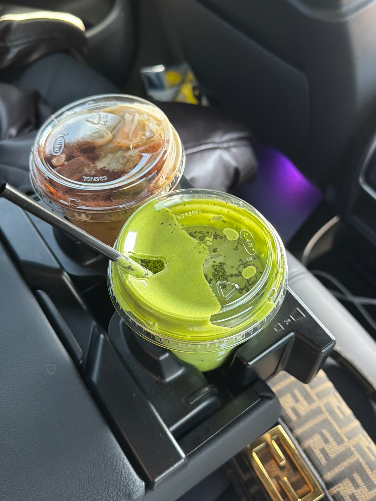 Two beverages spotted in car cup holder in Los Angeles