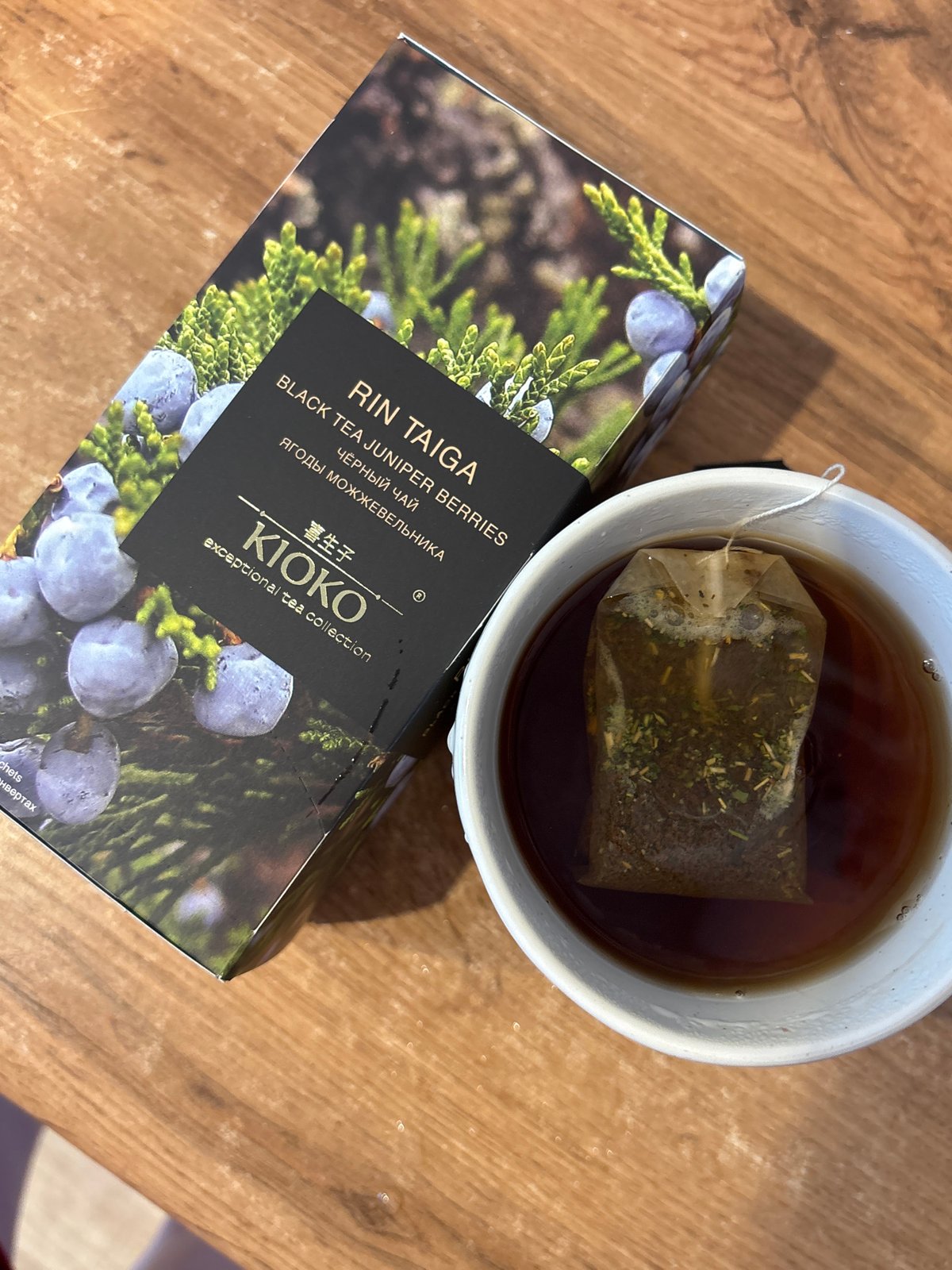 Juniper berry black tea, boxed and brewed
