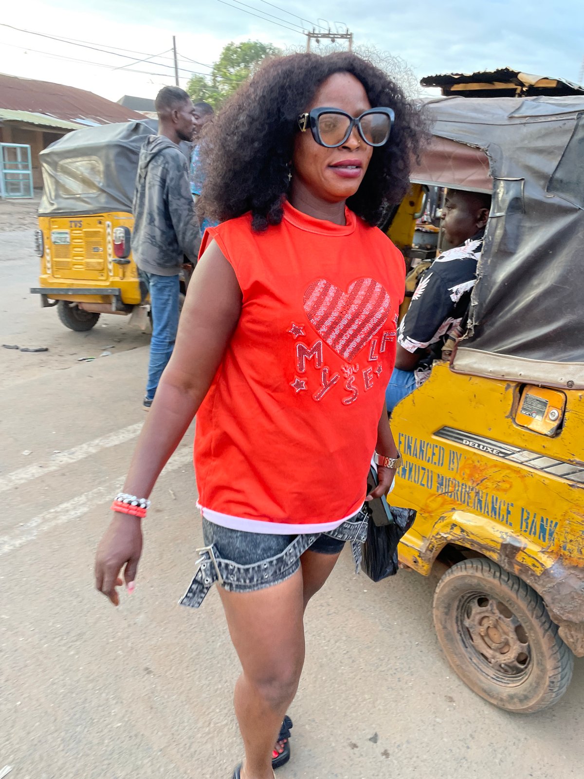 Everyday street life in Nkpor, Nigeria, late afternoon