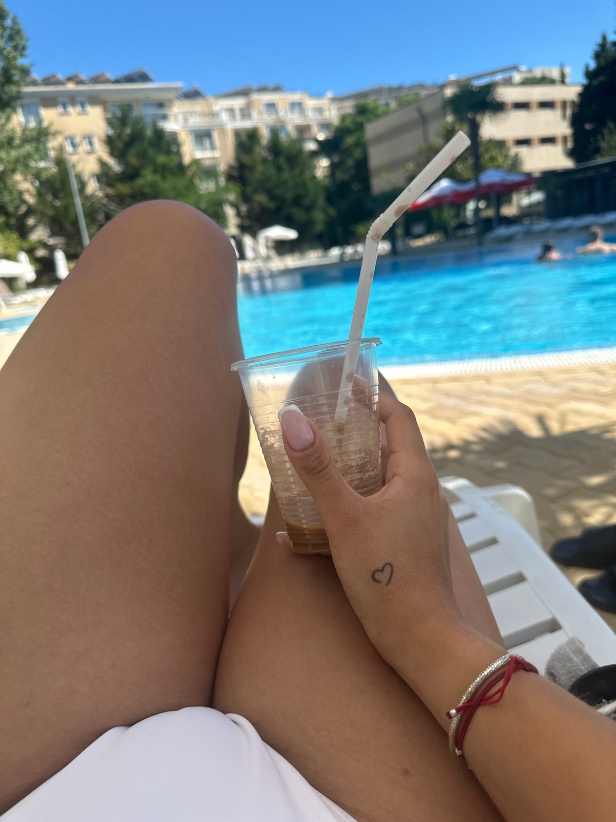 Poolside downtime at a Nesebar resort on a sunny afternoon