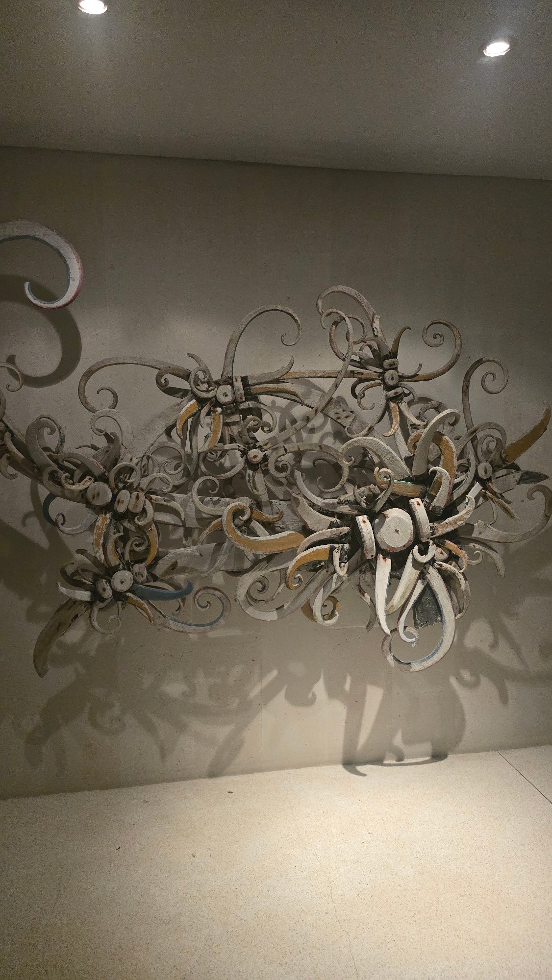 Ornamental wall art documented in Kuta Selatan interior