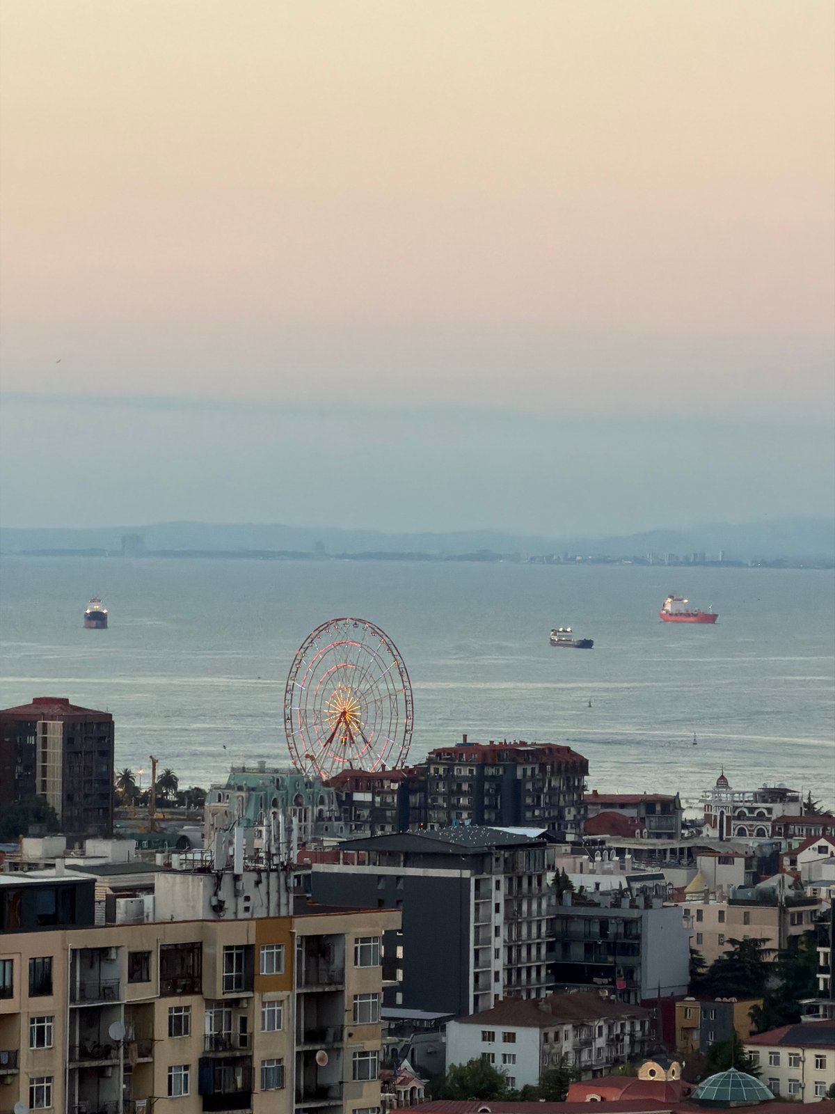 Batumi's urban coastline meets the Black Sea from above