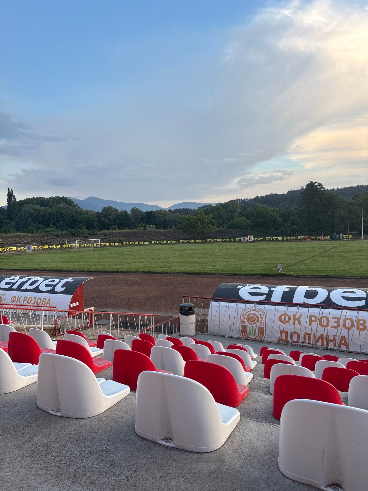 Empty football stadium captured during golden hour in Kazanlak, Bulgaria