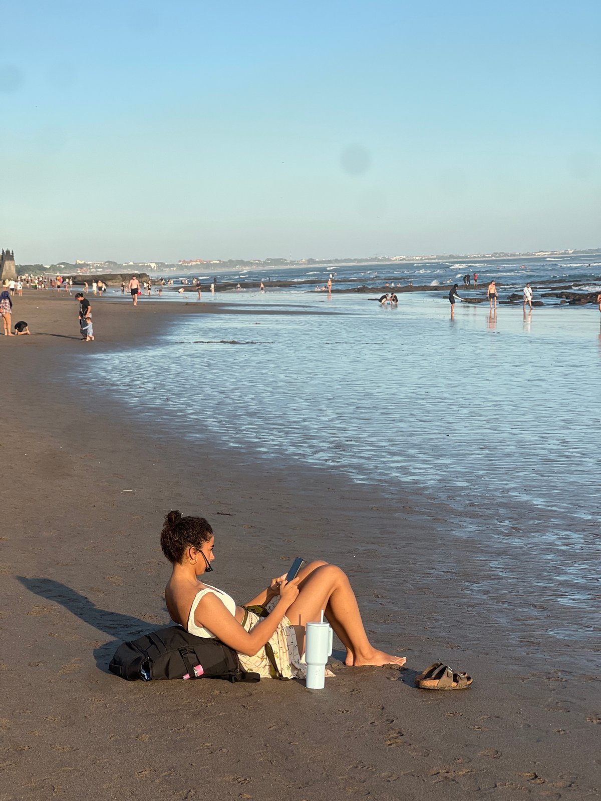 Busy morning on North Kuta beach, surfers and beachgoers out early