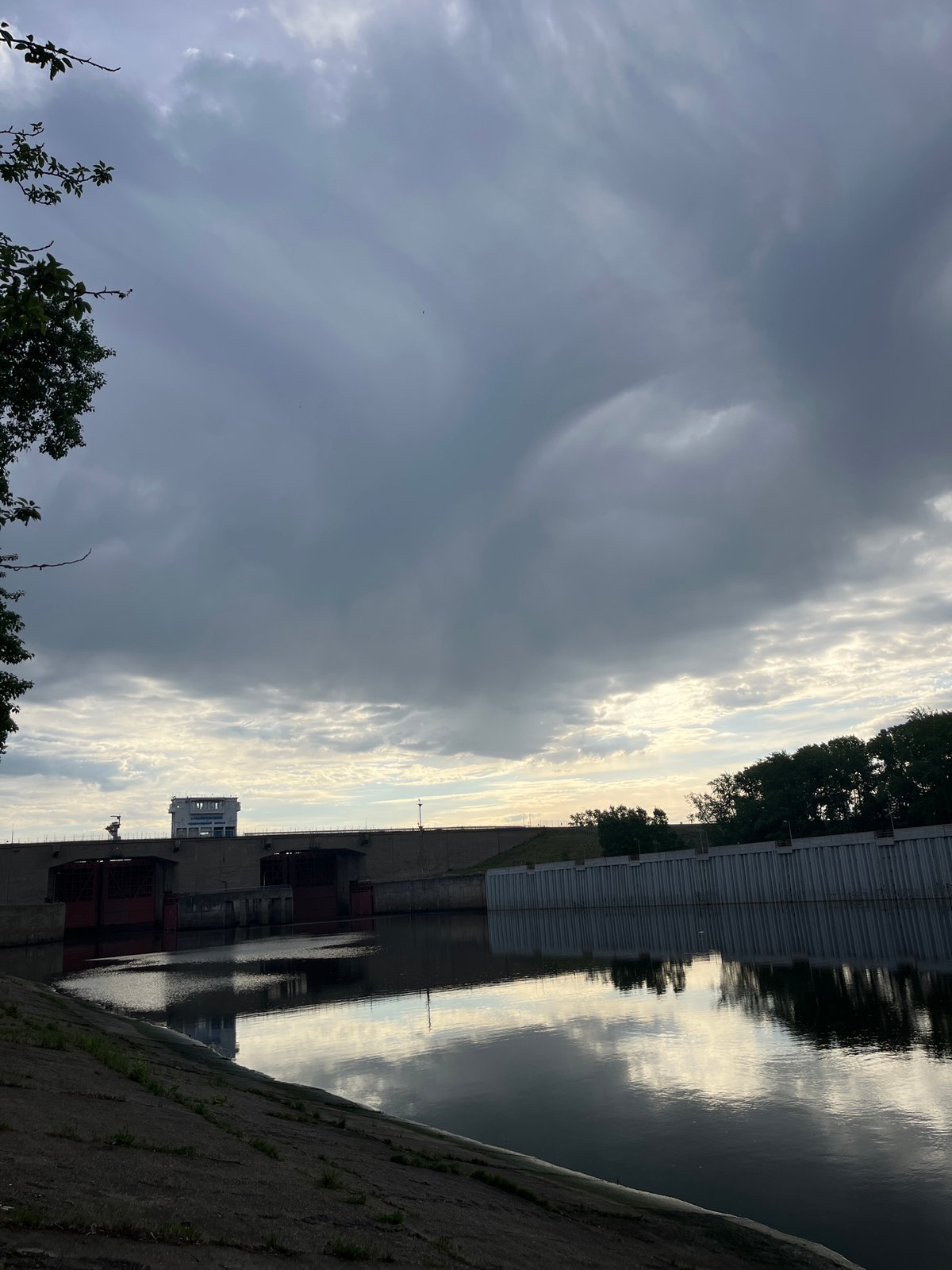 Cyclist documents ride through Chaikovsky, Russia near hydroelectric dam