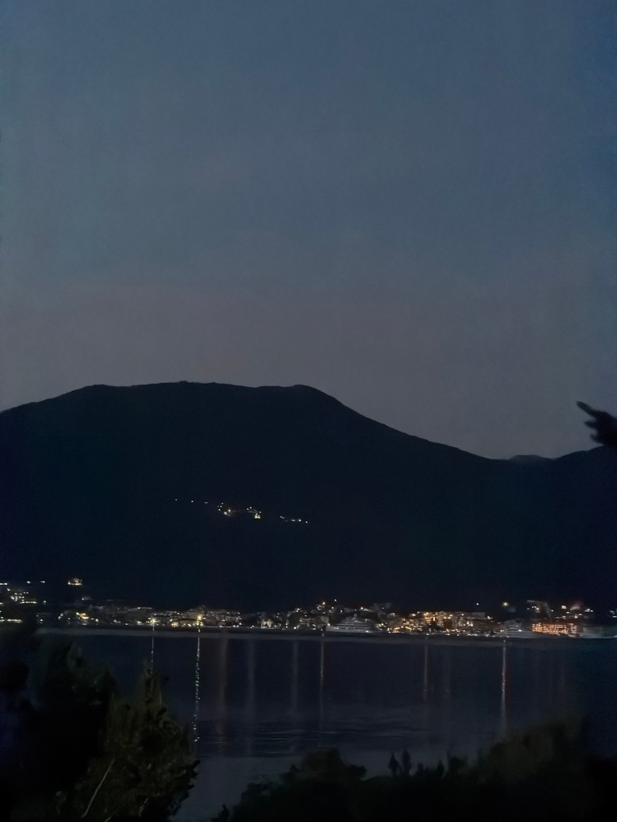 Evening twilight views and traditional meal documented in Gošići, Montenegro