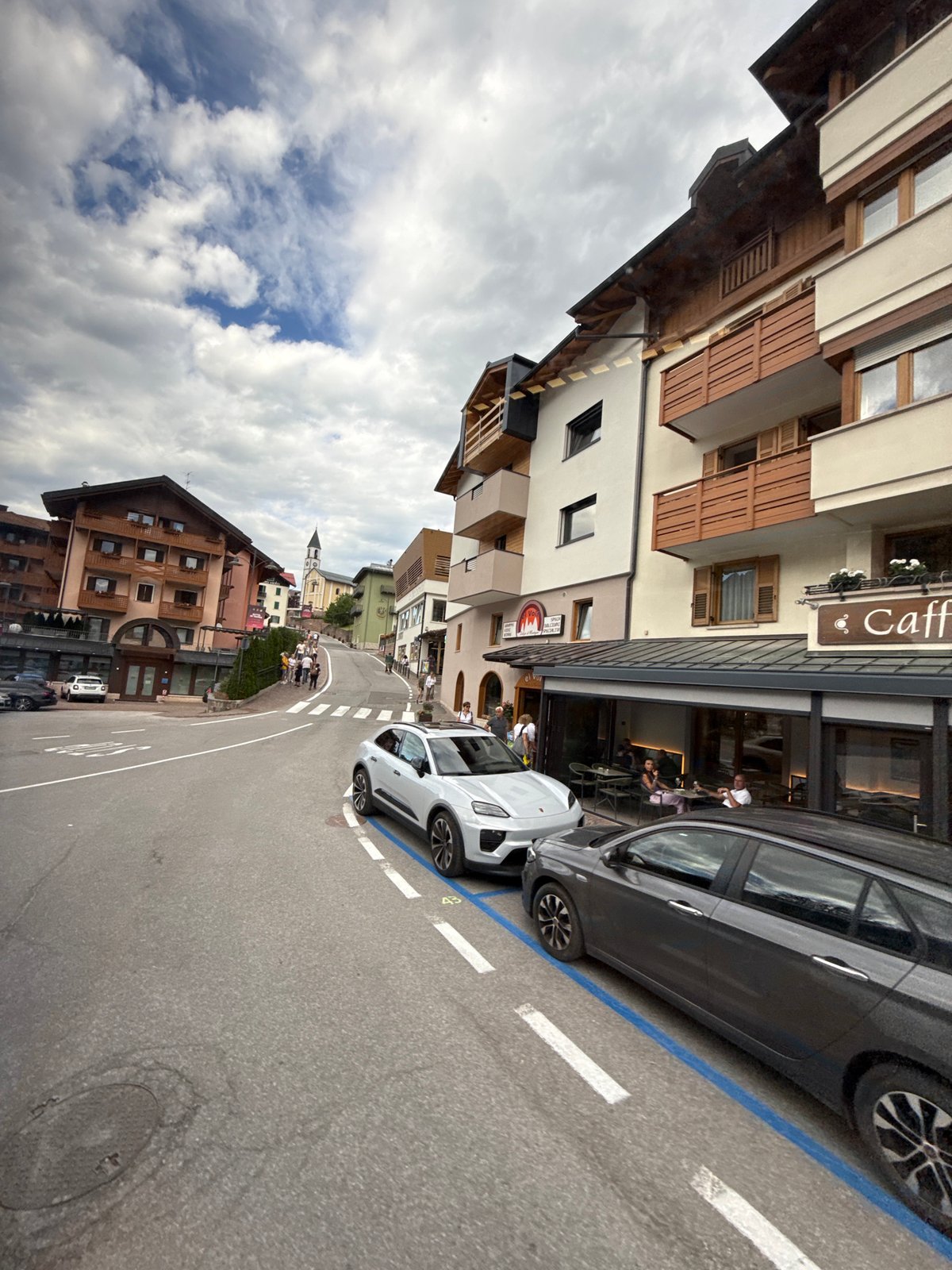 Quiet street corner in Andalo, Italy, on a cloudy afternoon