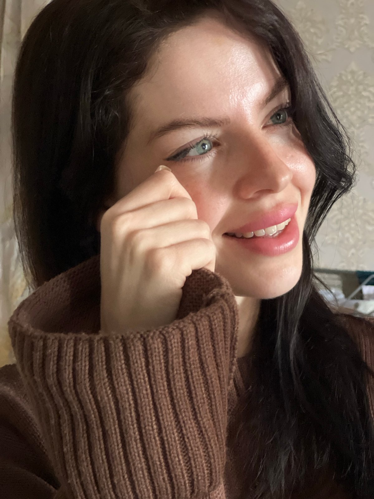 Woman photographed indoors in Krasnodar, Russia morning hours
