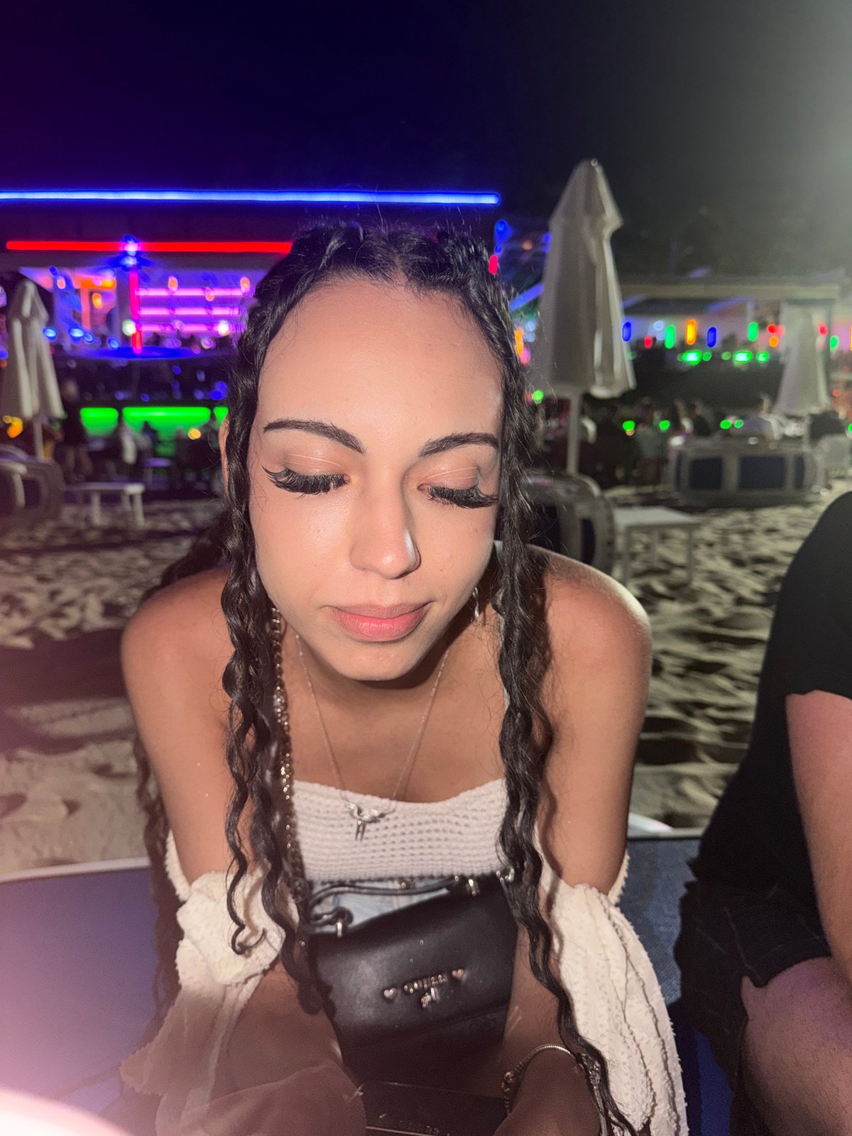 A laid-back night out at a beachside bar and dining spot.