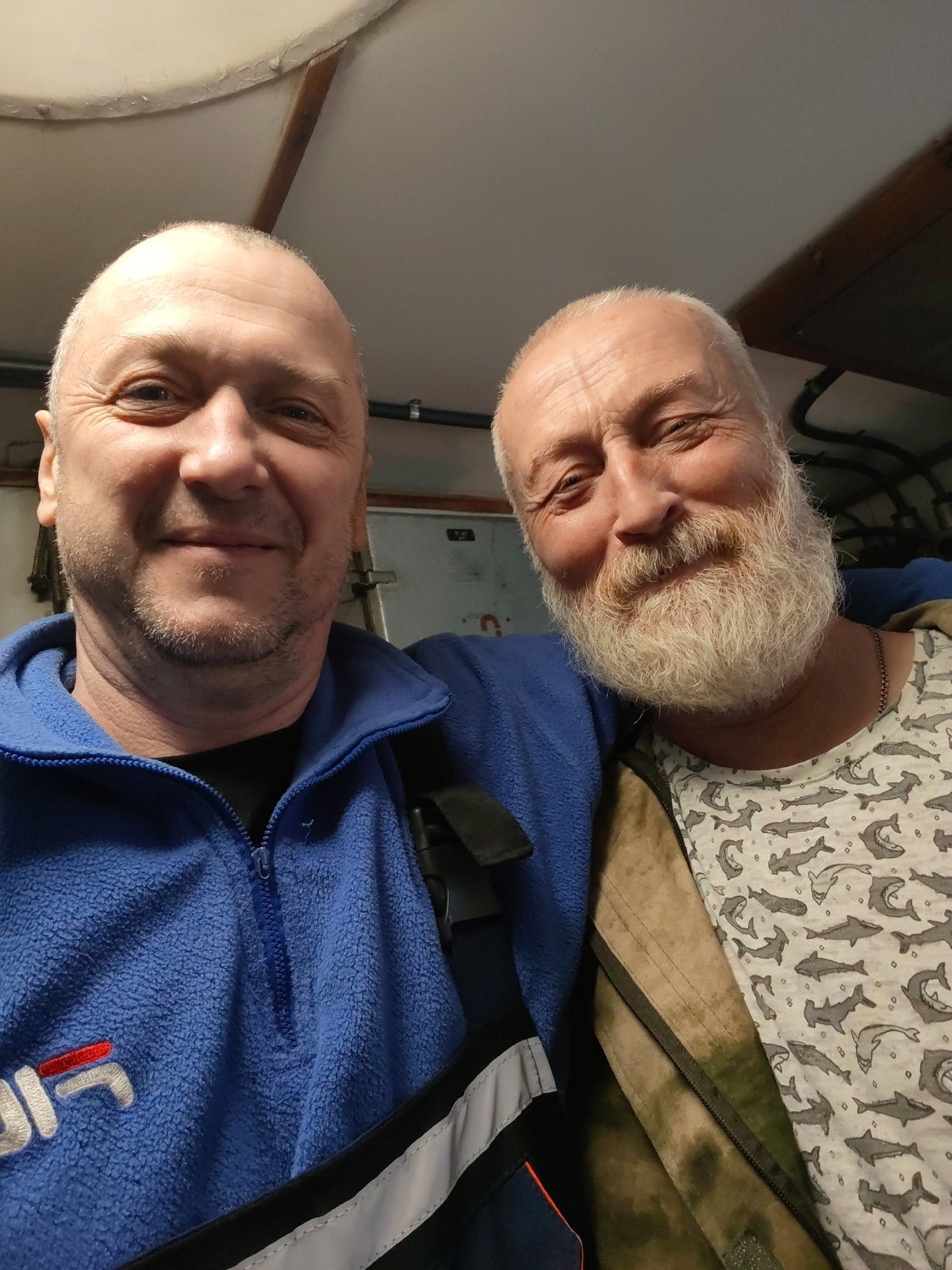 Two friends capture indoor selfie moment