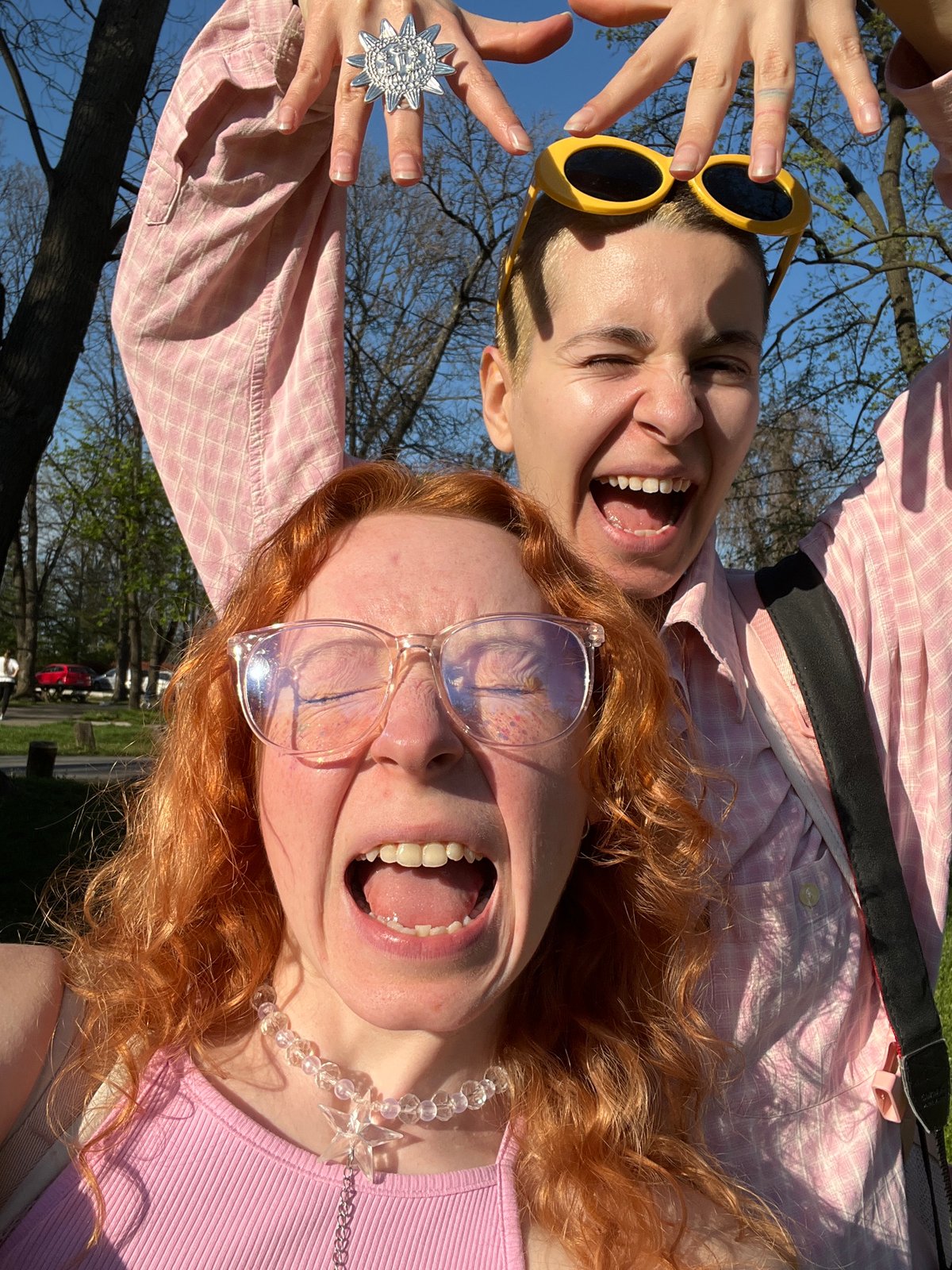 Person in pink plaid poses for photos in Belgrade park