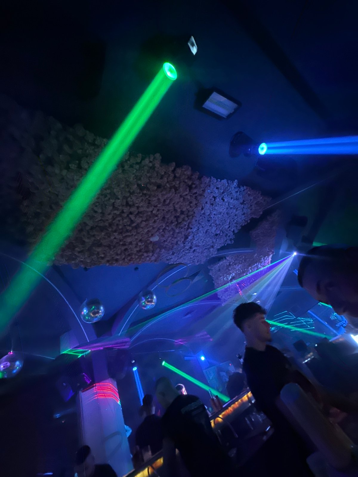 Nightclub scene captured in Sliven, Bulgaria with laser lighting