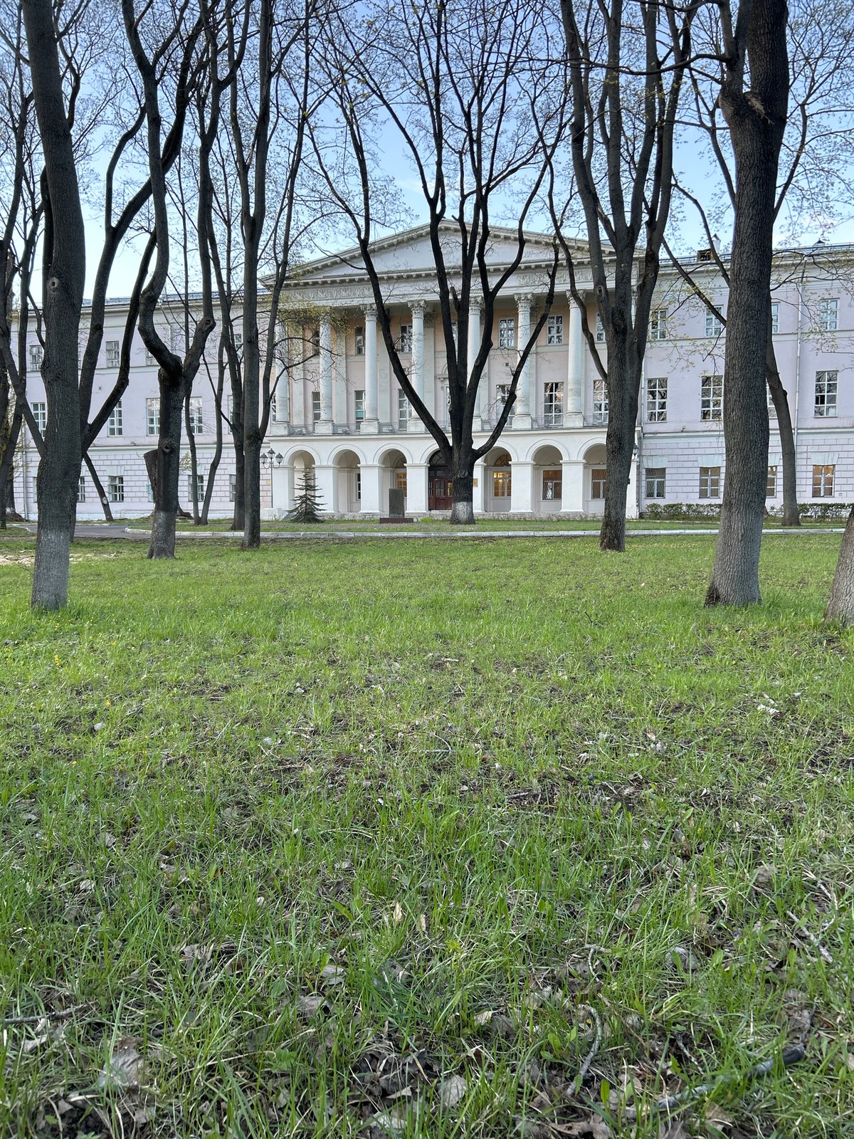 Moscow visitor documents neoclassical building and statue scenes