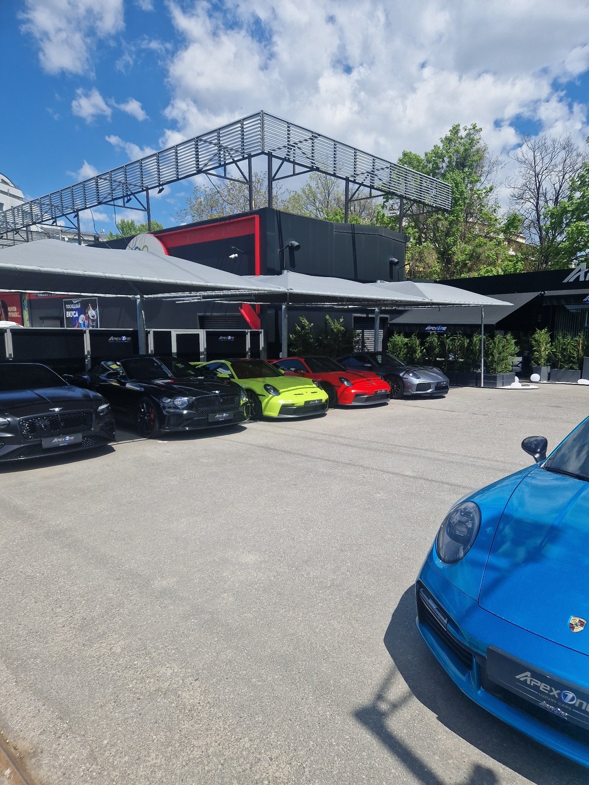 Luxury car display observed at Apex One dealership