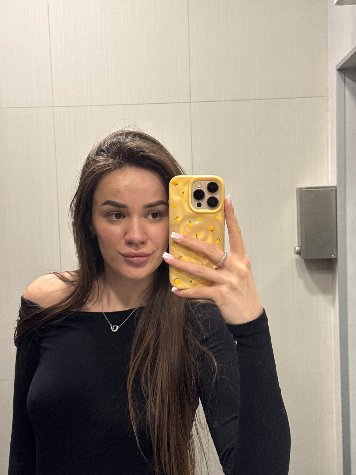 Restroom selfies and jewelry flat-lays from a single outing