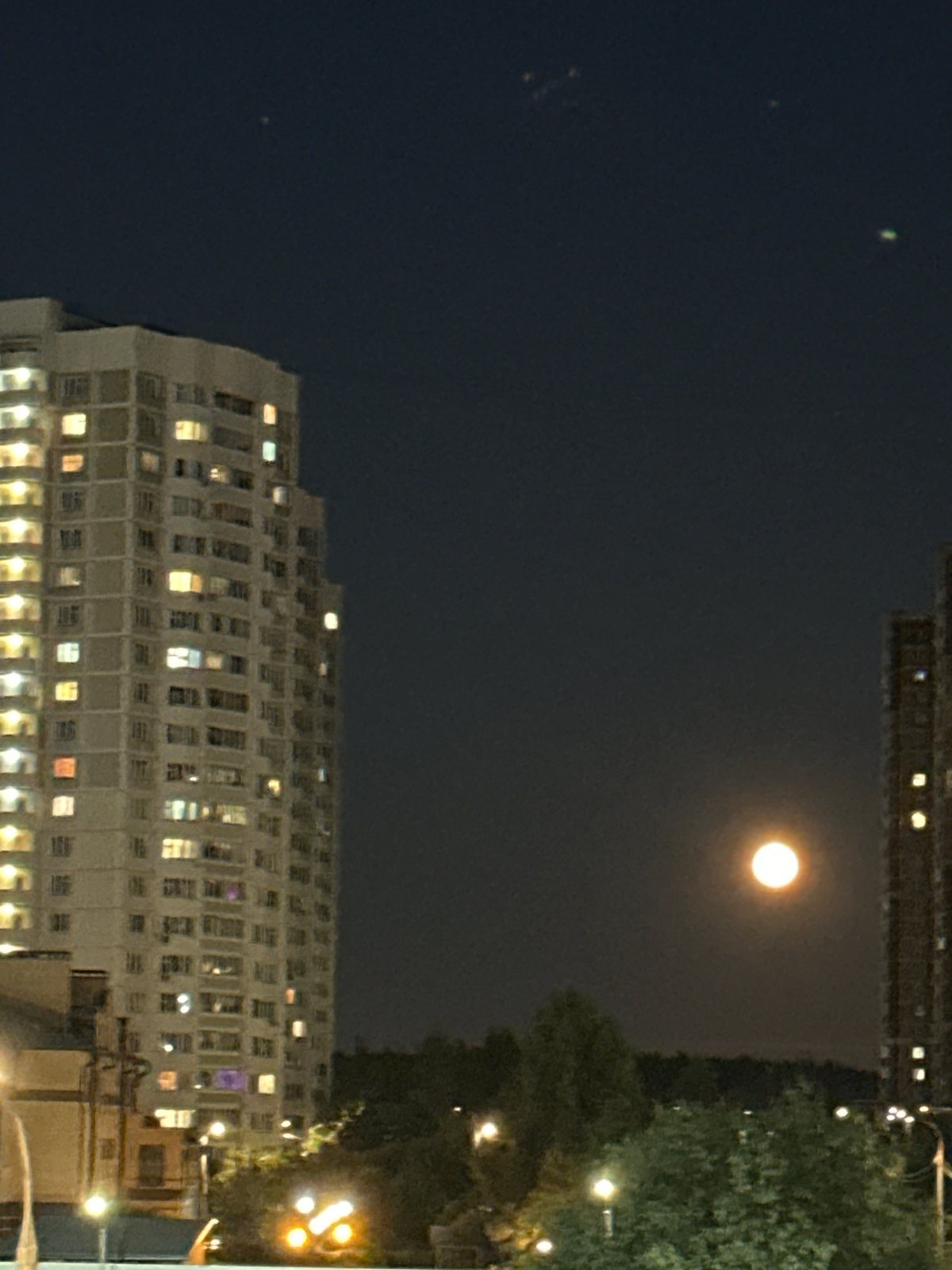 Summer night in a Podolsk residential neighborhood, full moon out