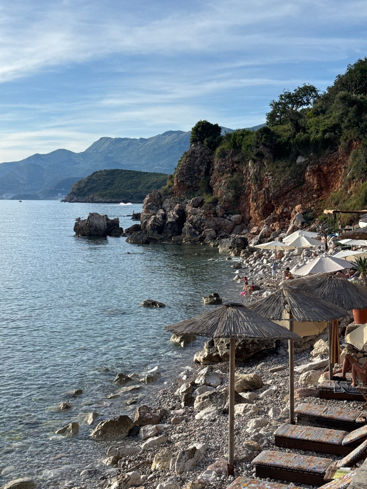 Coastal Montenegro afternoon: beaches, mountain roads, and stone architecture