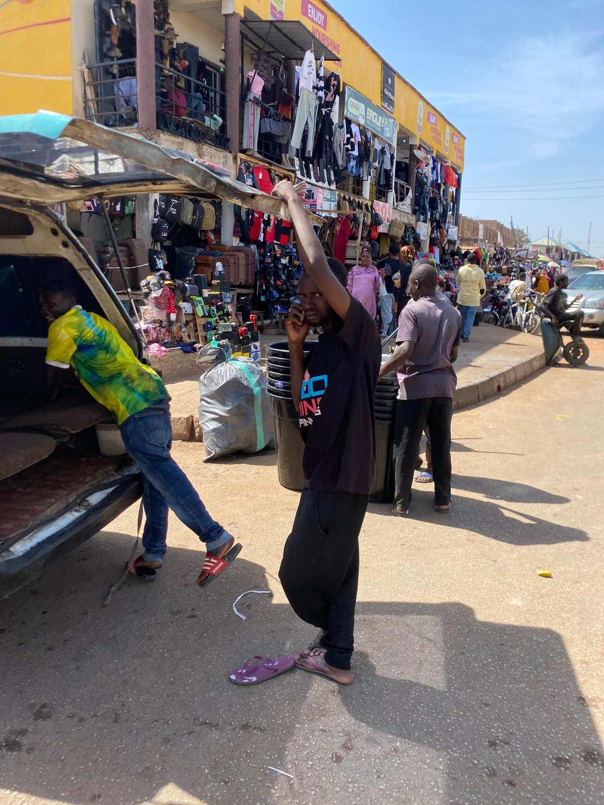 Daily life unfolds in Bukuru Nigeria's bustling midday markets