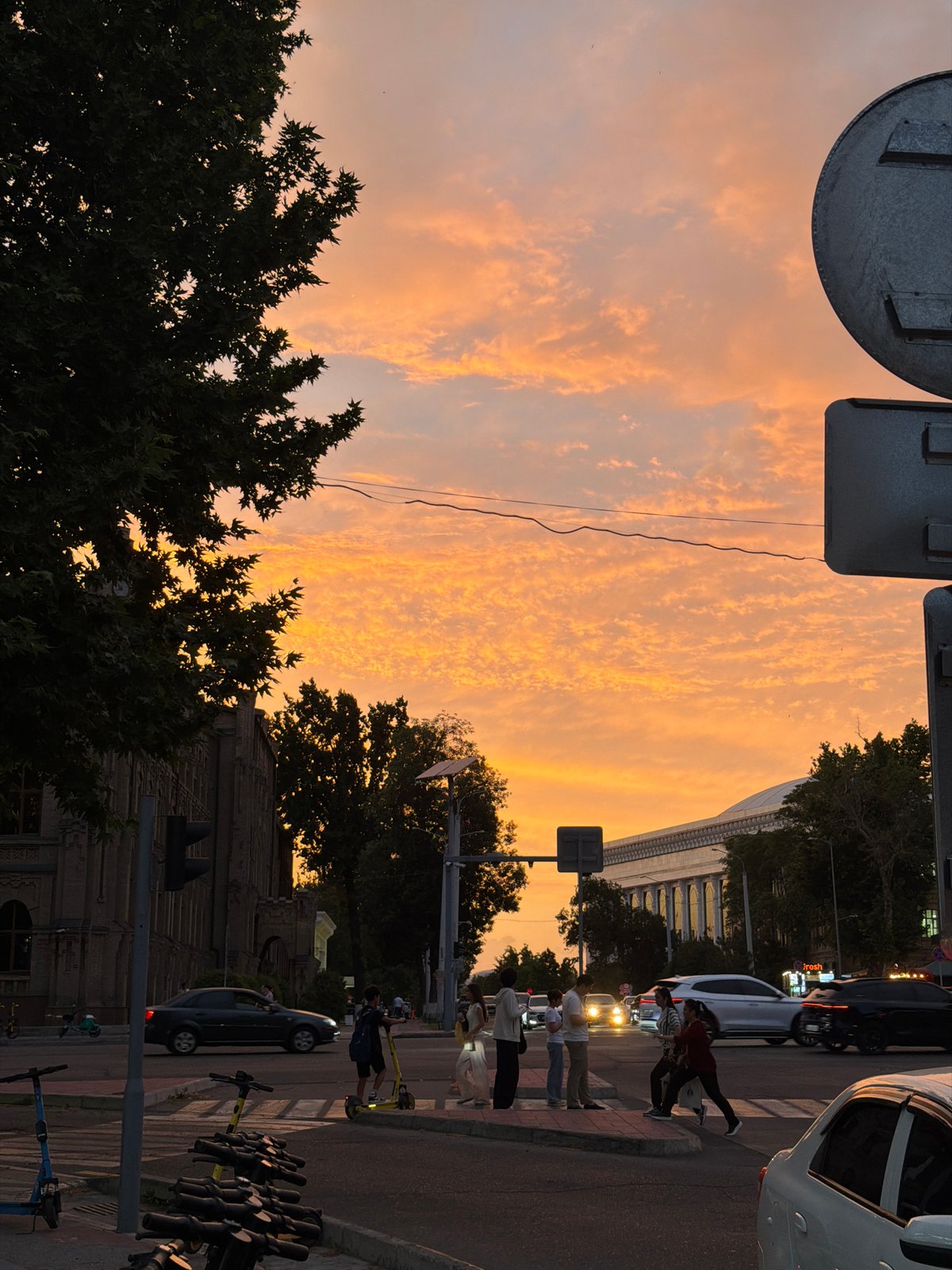 Dramatic sunset illuminates Tashkent streets with vibrant colors