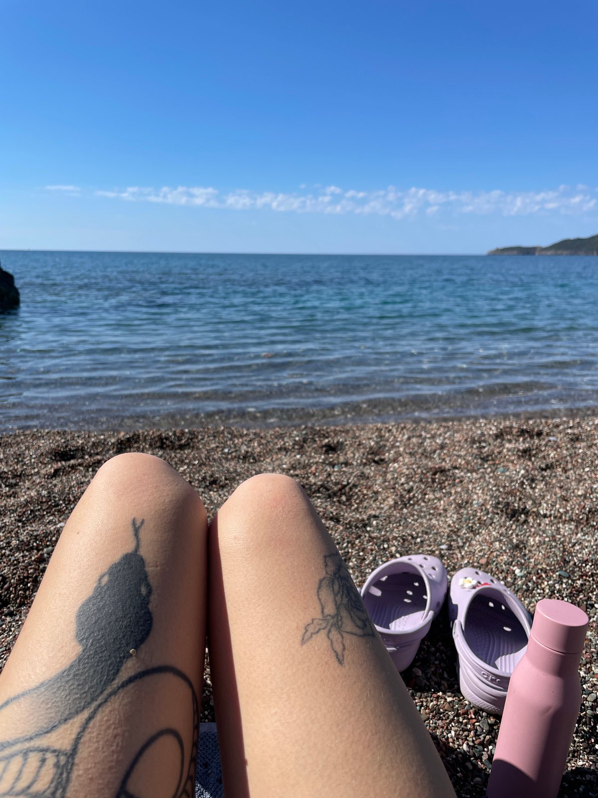 Morning beach relaxation captured in Rafailovići, Montenegro