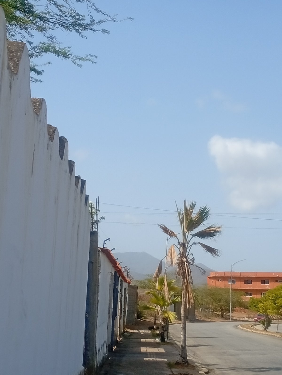 Young man documents sunny afternoon journey through Venezuelan towns