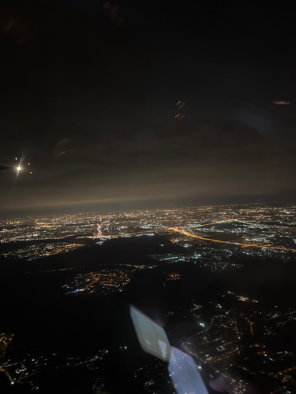 Nighttime aerial view captures illuminated Khimki cityscape