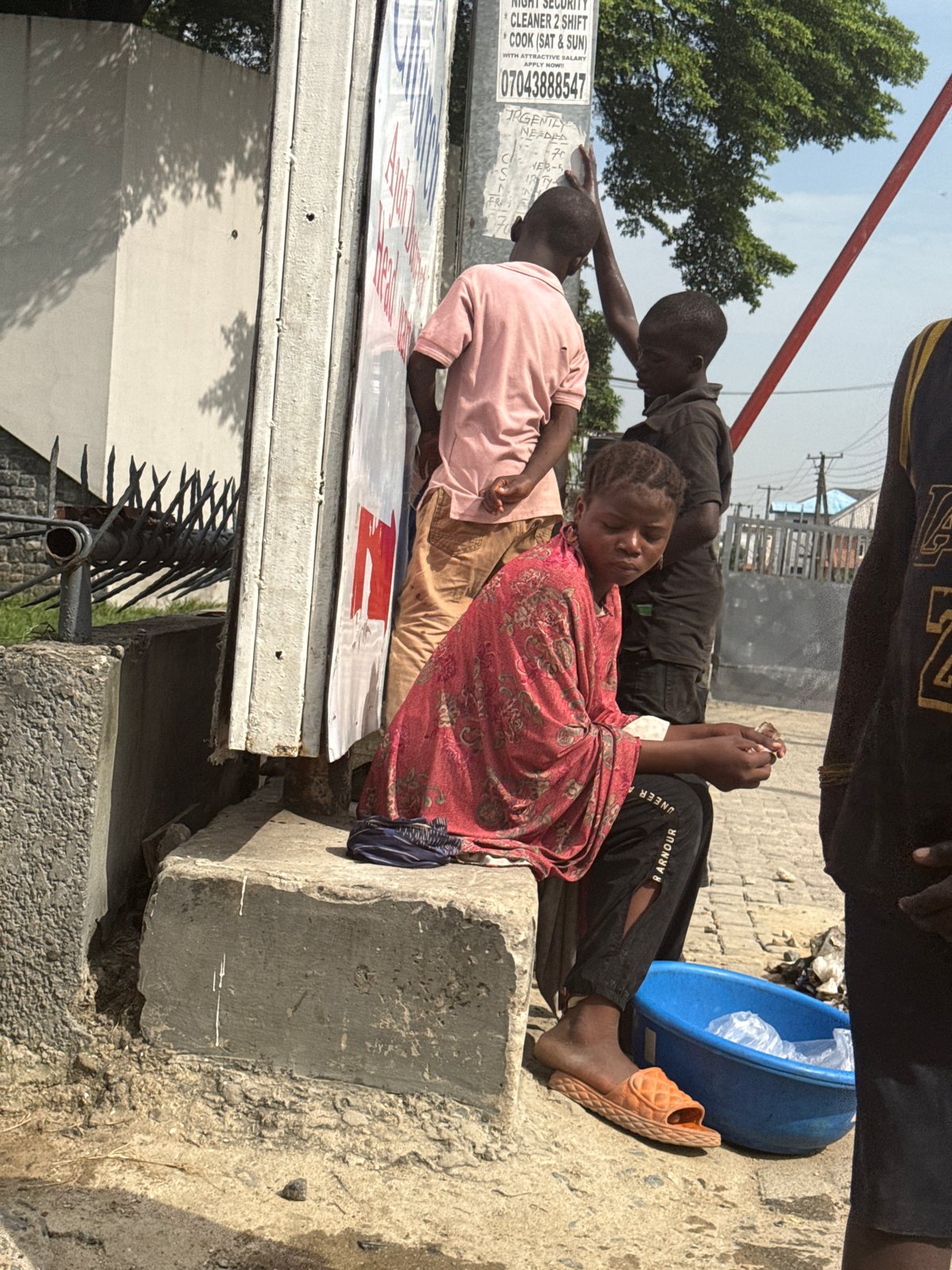 Young people gather on street in Epe, Nigeria