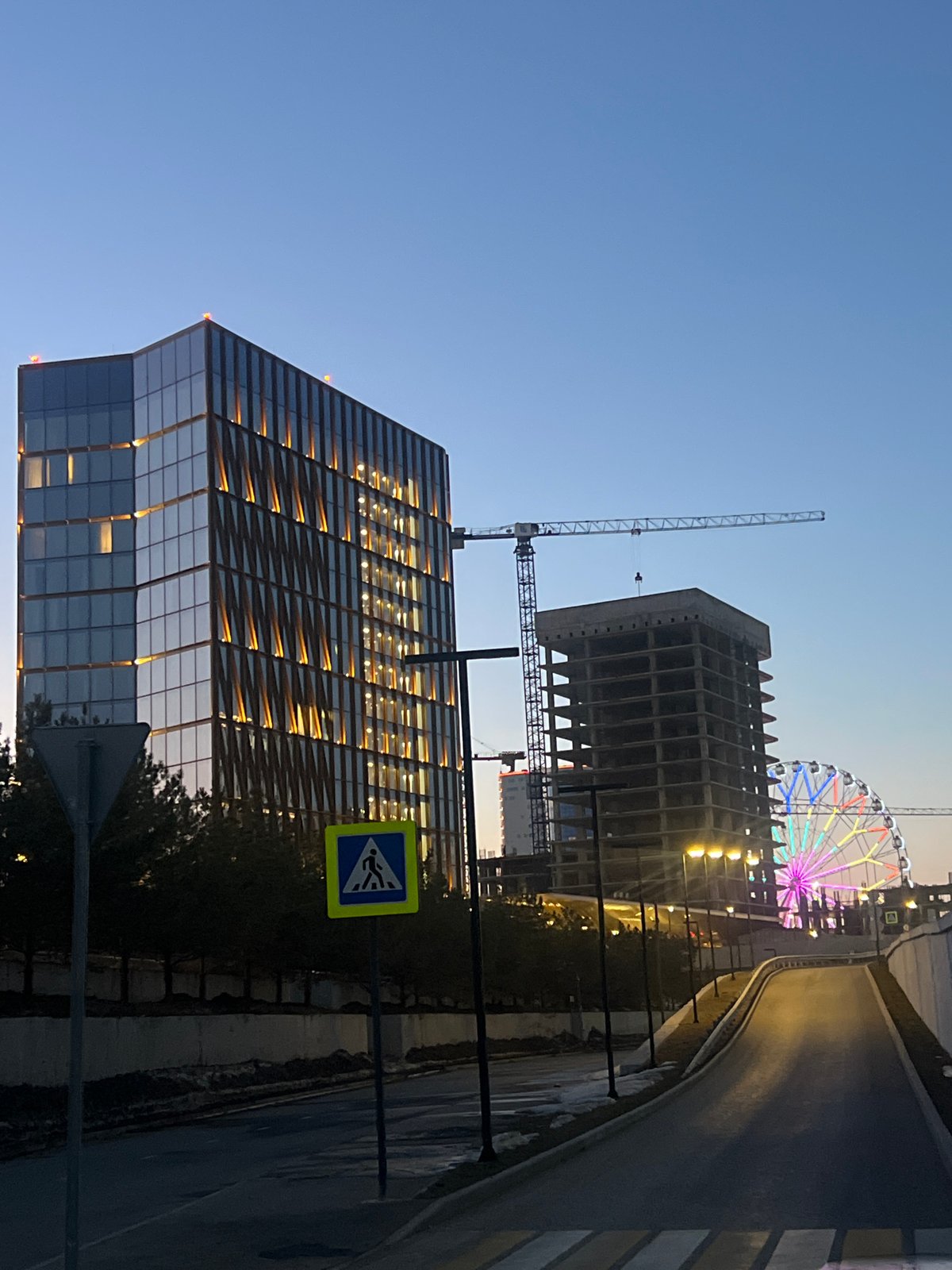 Dusk street scene captured at pedestrian crossing in Kazan
