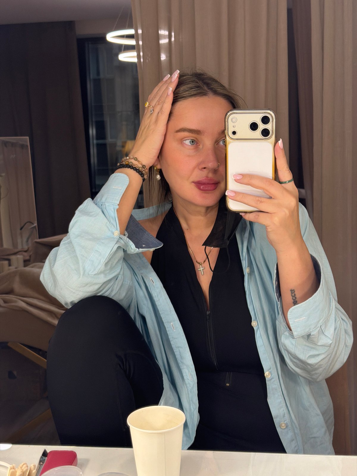 Woman takes mirror selfie in Moscow